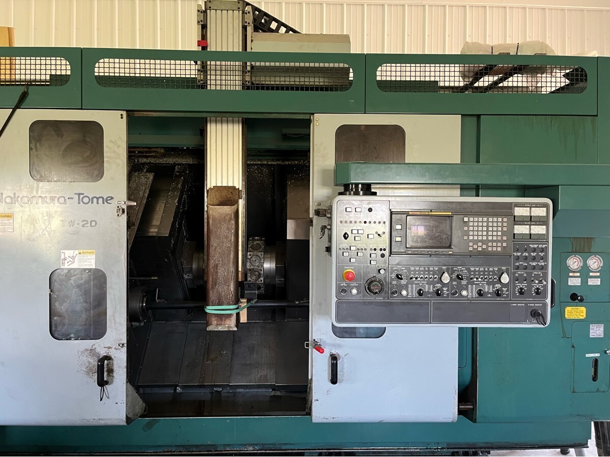 2001 NAKAMURA TOME TW-20 WITH ROBOTIC GANTRY LOADER/UNLOADER CNC Lathes | Silverlight CNC, Inc